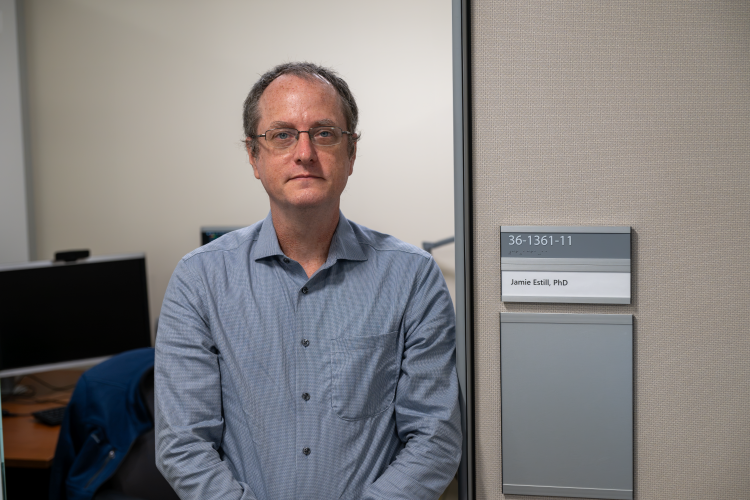 Dr. Jamie Estill at his office in the North Campus Research Complex